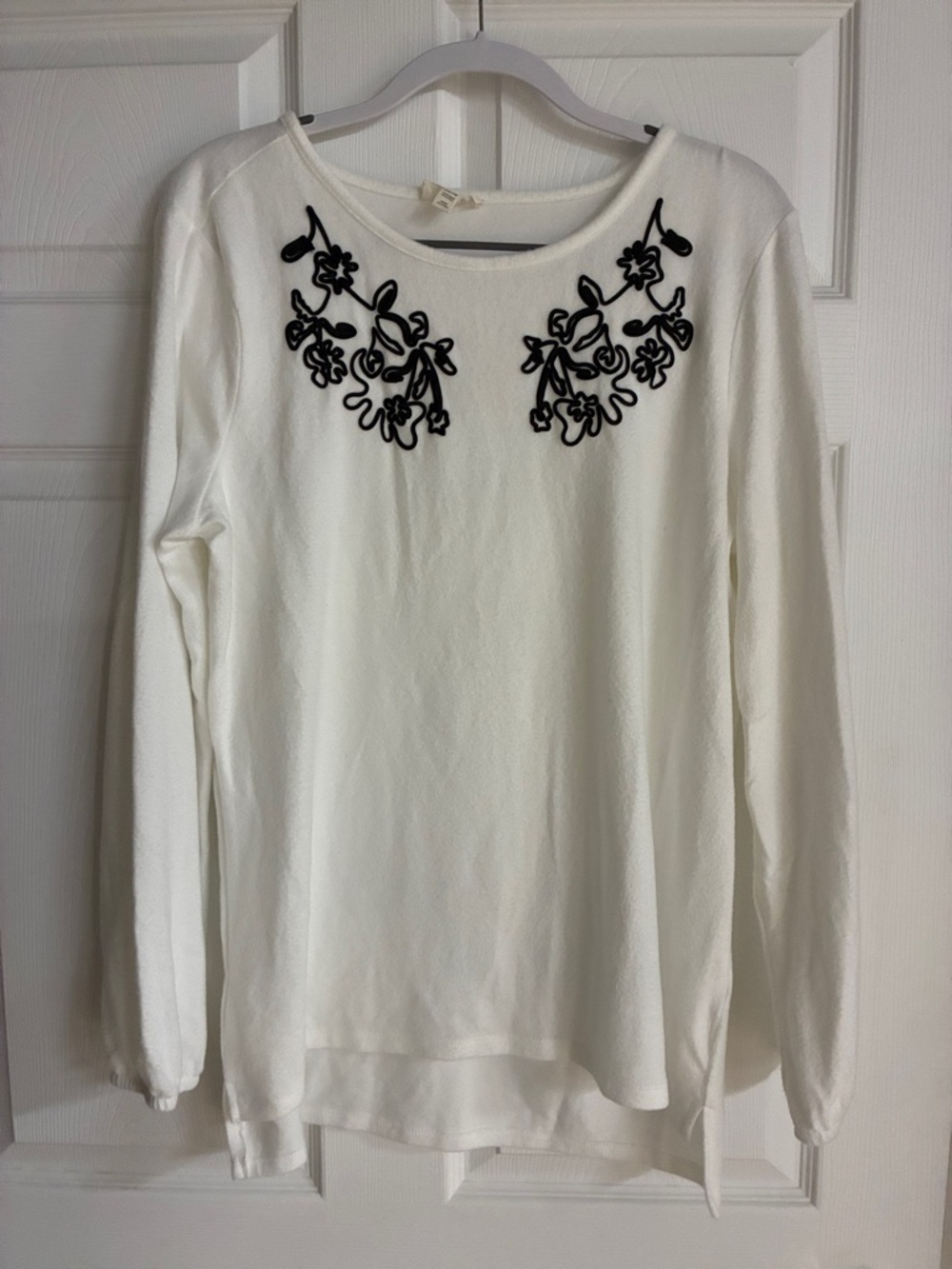 White Long-Sleeve Tee with Black Floral Appliqué